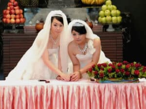 Photo of a female couple: Same Sex Marriage in Taiwan, courtesy Wikimedia Commons