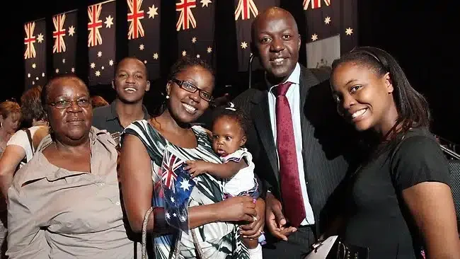 A photo of a happy family who meet the Australian citizenship residence requirement